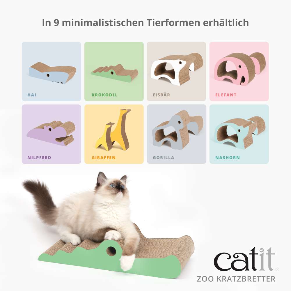 Eine Katze liegt auf dem Kratzbrett Krokodil.
