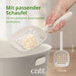 Mit passender Schaufel für ein einfaches Ausschaufeln (enthalten), Hand hält Schaufel mit Streu.