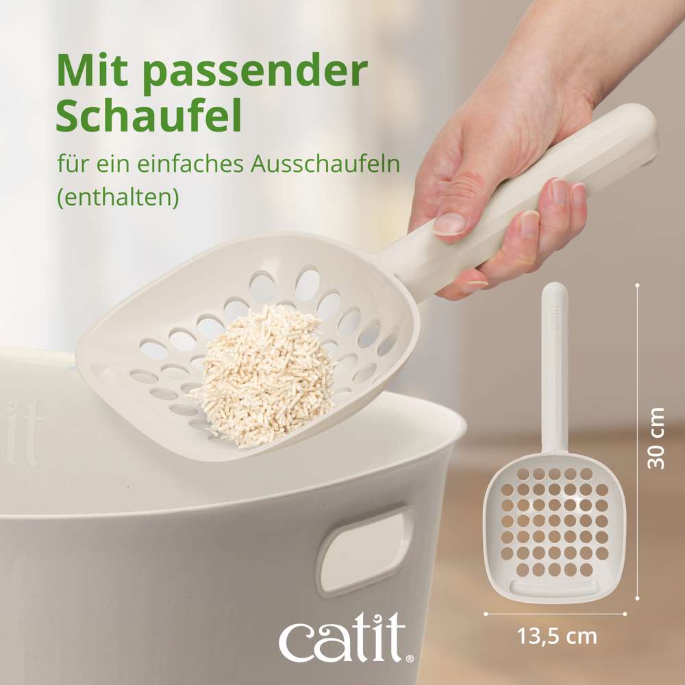 Mit passender Schaufel für ein einfaches Ausschaufeln (enthalten), Hand hält Schaufel mit Streu.