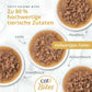 Zu 80 % hochwertige tierische Zutaten in Catit Cuisine Bites Katzenfutter, vier Schalen mit Lachs, Thunfisch, Huhn und Ente.